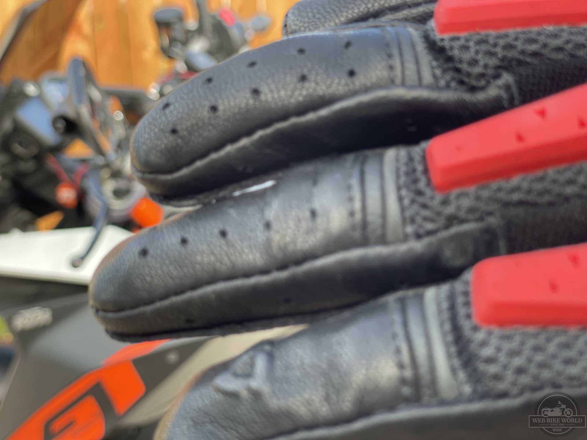 Close-up of perforations in leather fingers on REV'IT Sand 4 Gloves