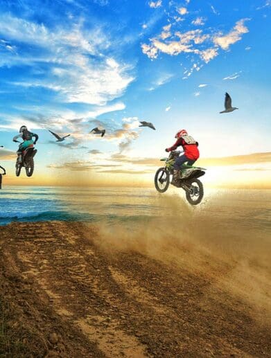 riders goingoff a dirt jump