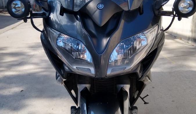A view of the 2015 Yamaha FJR1300 taken through a record-breaking 32 hours at the Cannonball Baker Sea-To-Shining-Sea Memorial Trophy Dash, completed by an Alex Jones. Media: Gleaned from his Craigslist post, since he is selling the motorcycle.