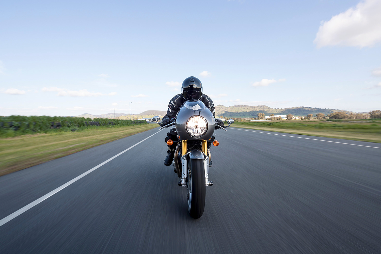 Triumph Thruxton motorcycle at race track in New South Wales