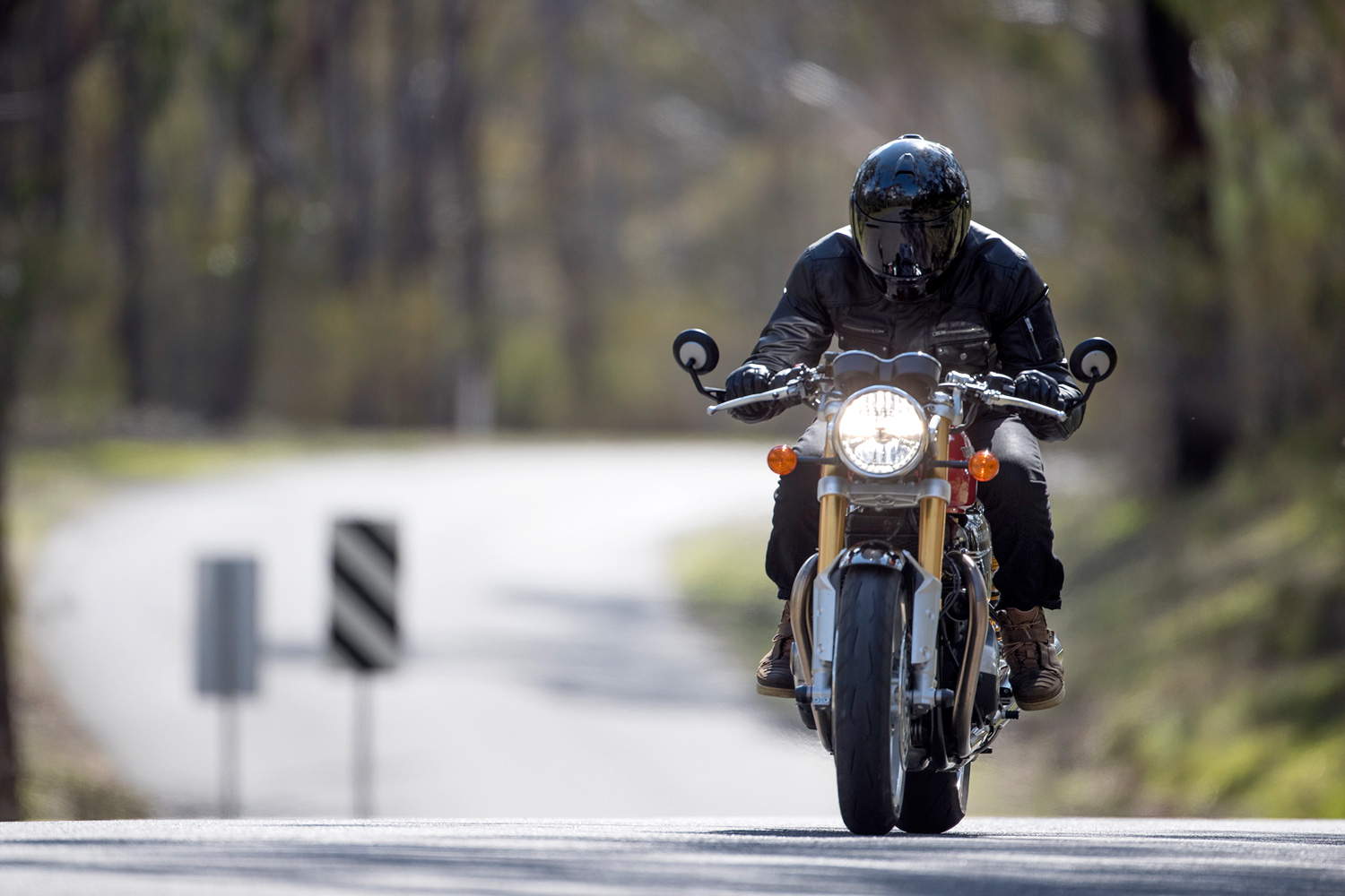 Triumph Thruxton motorcycle on quiet road in New South Wales
