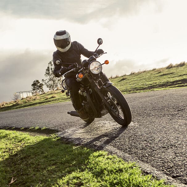 A Triumph T120 motorcycle at a hill climb track in South Australia