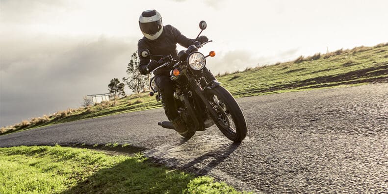 A Triumph T120 motorcycle at a hill climb track in South Australia