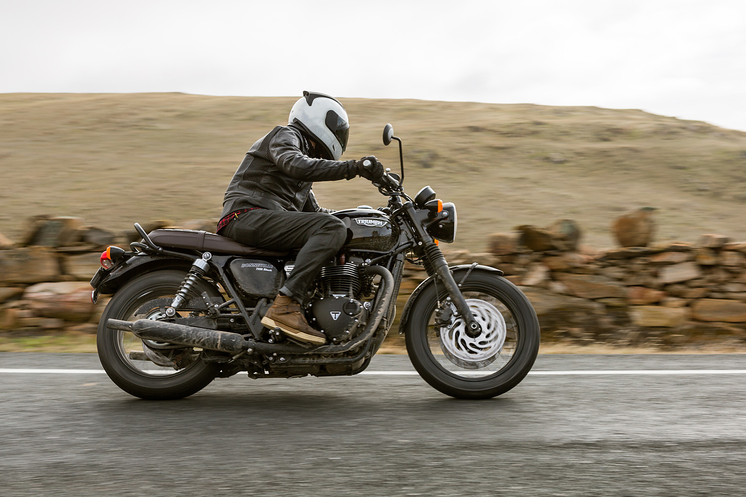 A Triumph T120 motorcycle on a country road in South Australia