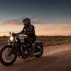 Two Triumph Bobber motorcycles at dusk in Broken Hill