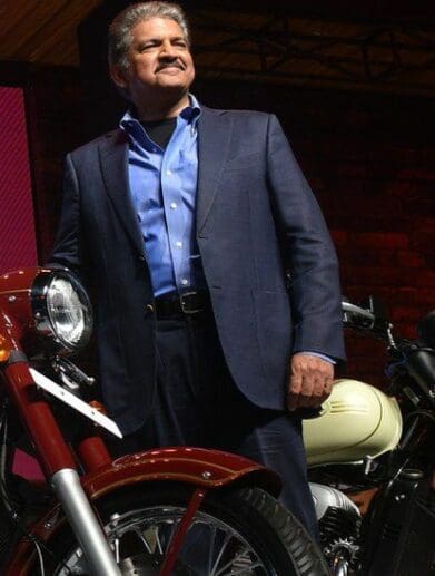 A view of Anand Mahindra - CEO of Mahindra Group - and stakeholder for 60% of BSA Motorcycles, next to a series of JAWA Motorbikes