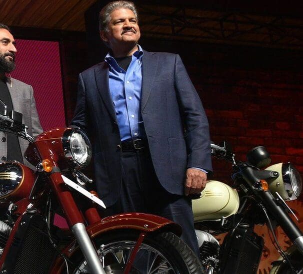 A view of Anand Mahindra - CEO of Mahindra Group - and stakeholder for 60% of BSA Motorcycles, next to a series of JAWA Motorbikes