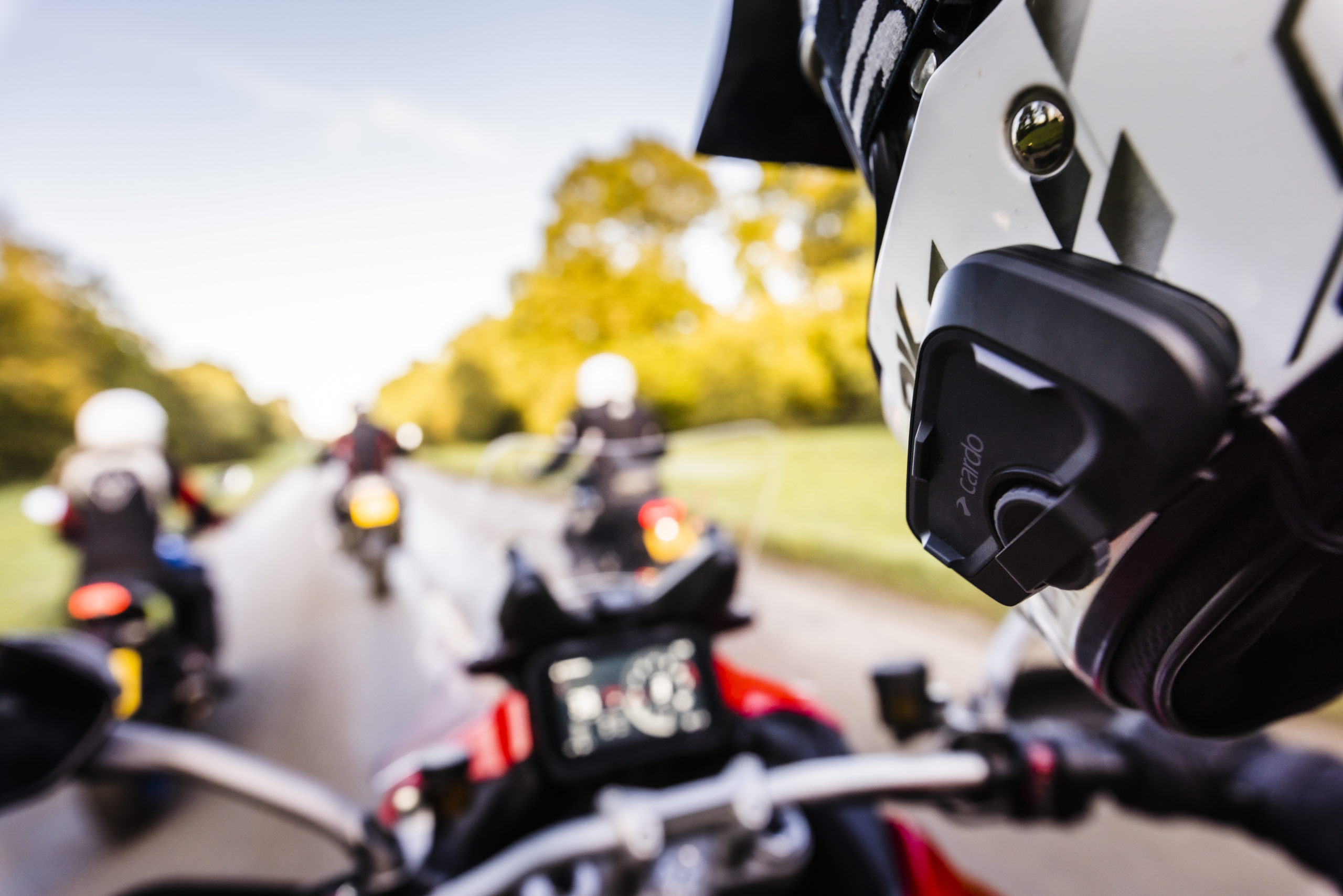 A view of two riders using the new Cardo Systems Bluetooth Communicators