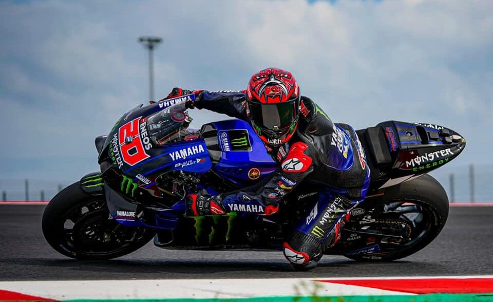 A view of Fabio Quatararo riding his bike at a MotoGP event