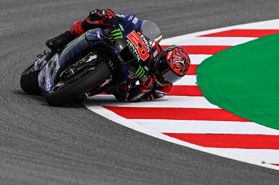 A view of Fabio Quatararo riding his bike at a MotoGP event