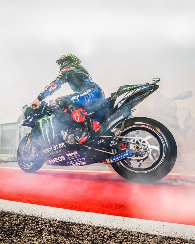 A view of Fabio Quatararo riding his bike at a MotoGP event