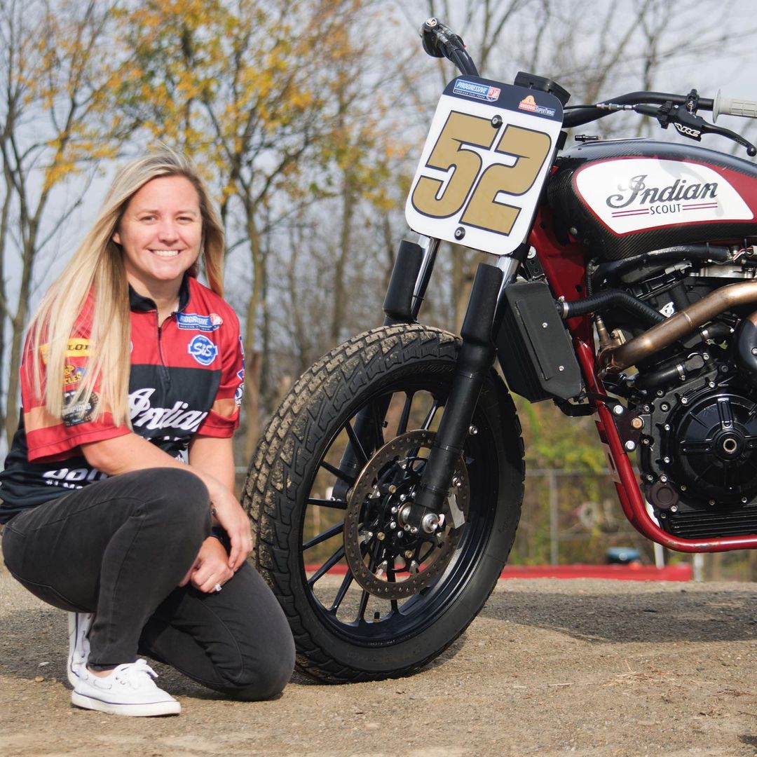 A view of Shayna Texter-Bauman next to the Indian FTR750 she will be riding for the SuperTwins 2022 Season