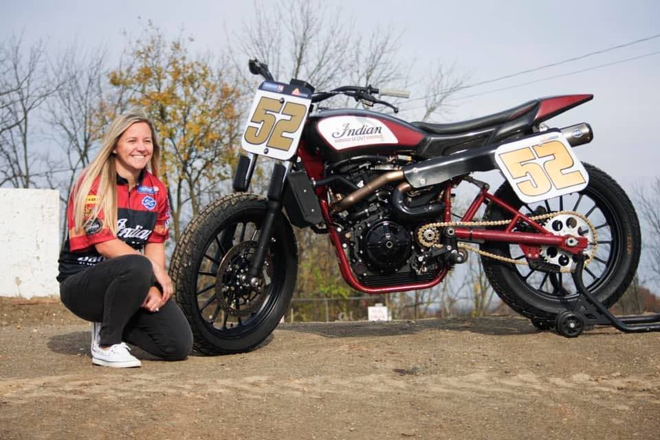 A view of Shayna Texter-Bauman next to the Indian FTR750 she will be riding for the SuperTwins 2022 Season