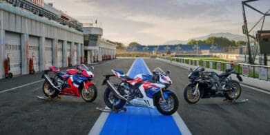 A side view of Honda's 30th Anniversary Limited Edition CBR1000RR-R Fireblade SP, all three colours