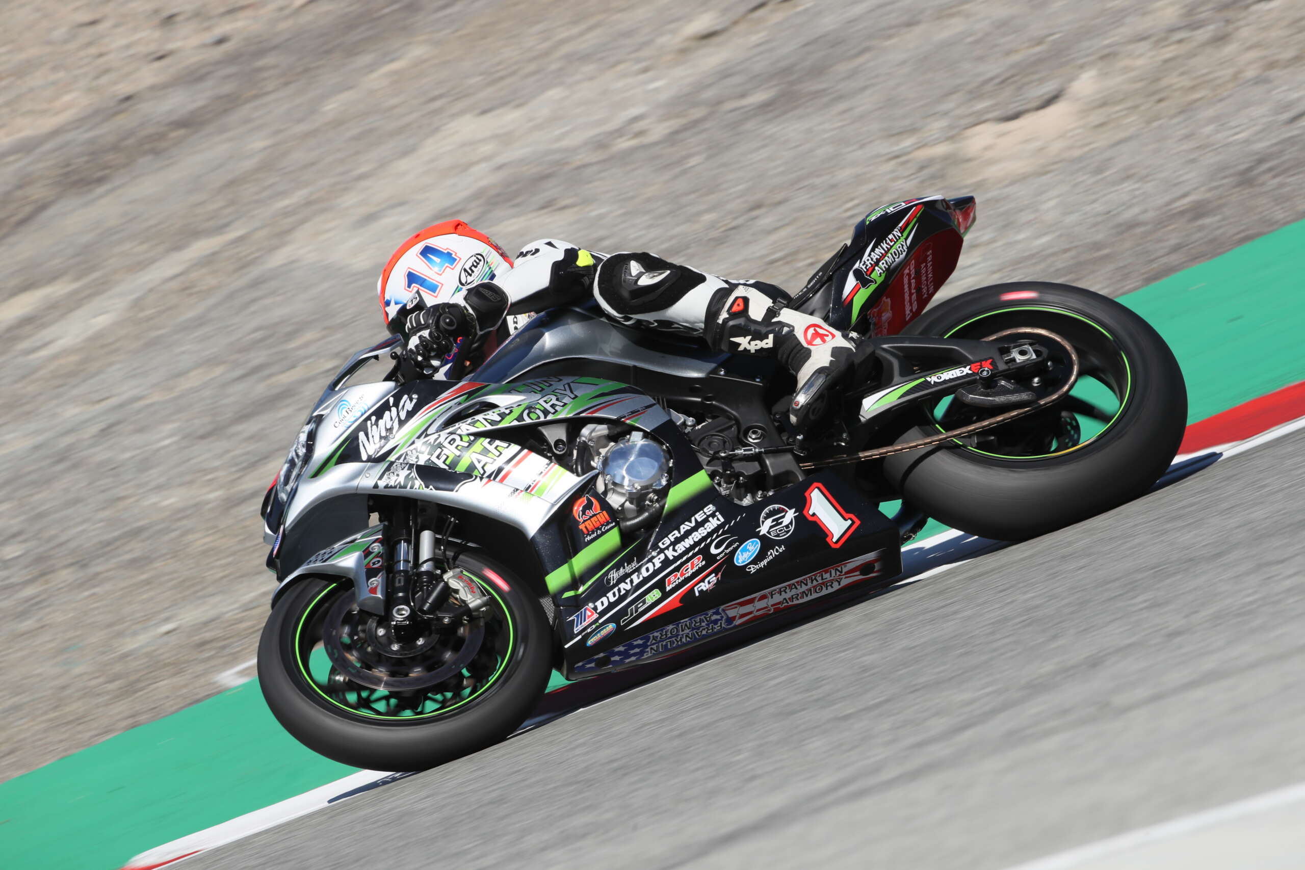 A view of racers speeding through a round of MotoAmerica