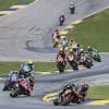 A view of racers speeding through a round of MotoAmerica