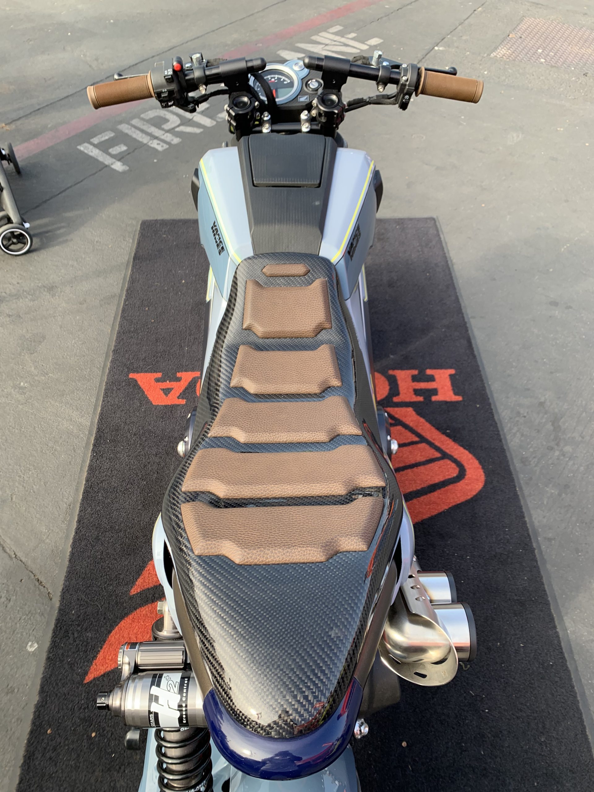 View of seat and bars on 2022 Honda Navi for IMS Outdoors 2021