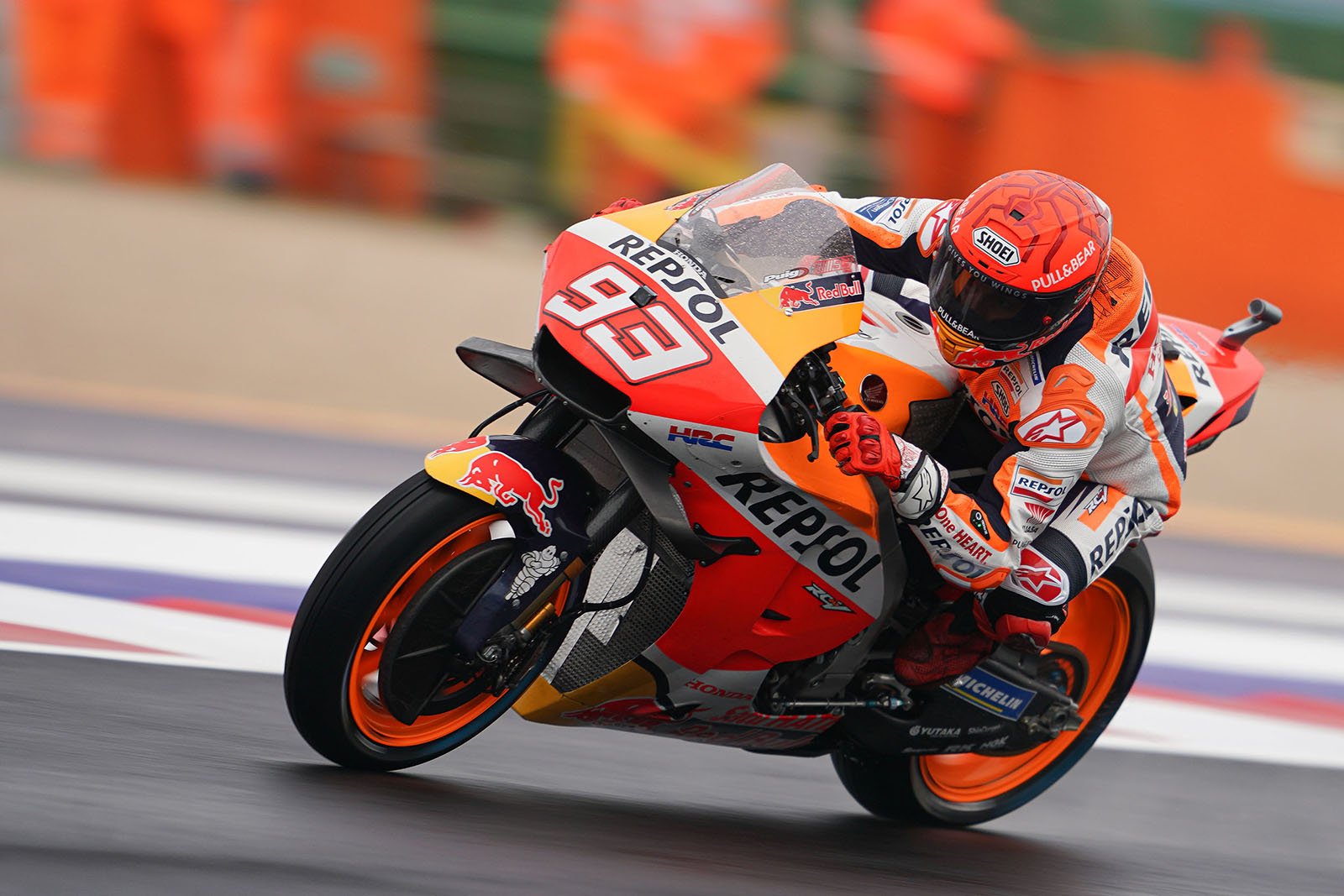 Marc Marquez leaning into the Track twisties as he races for Honda Repsol 2