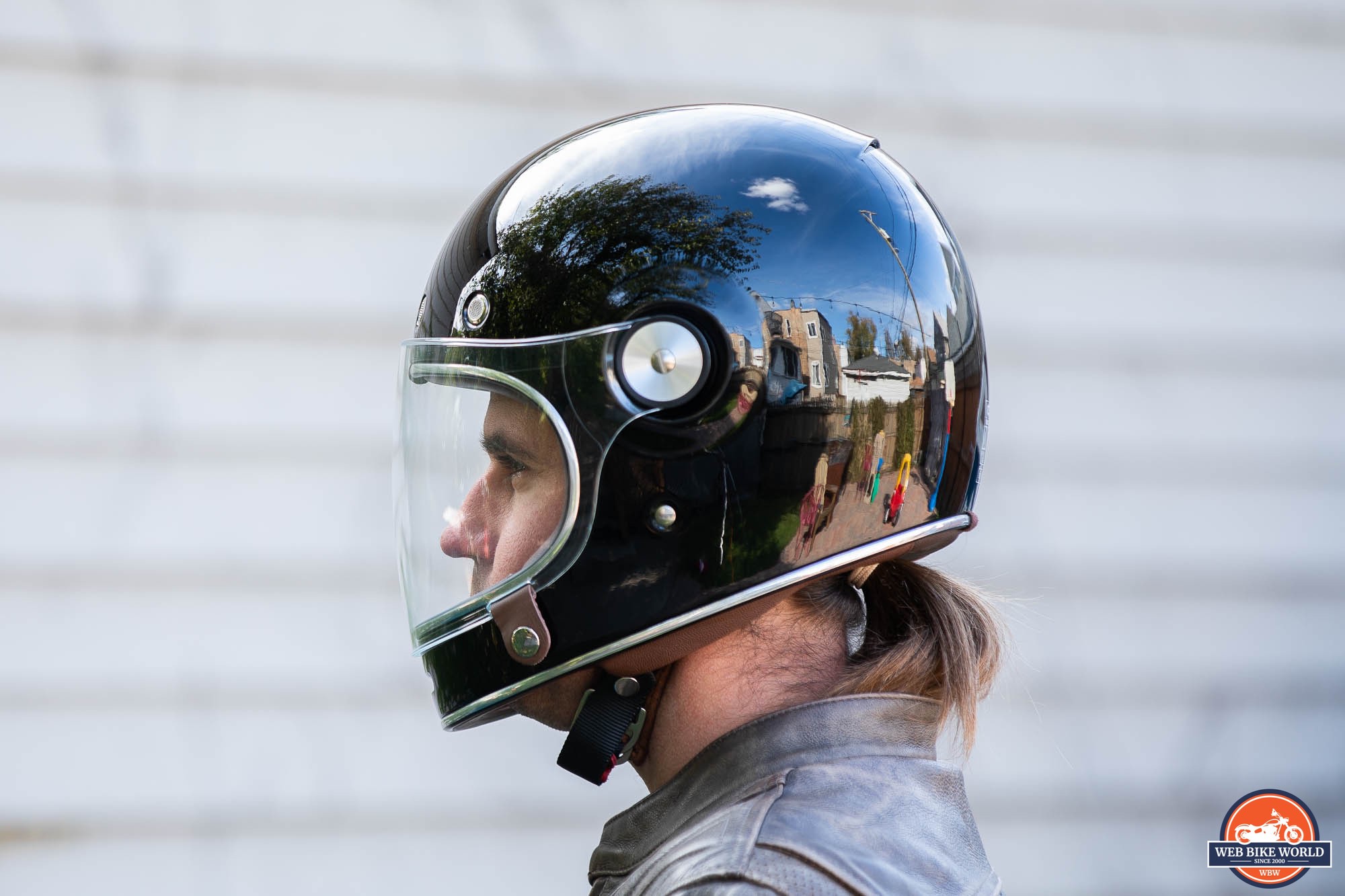 Side view of author wearing Bell Bullitt Helmet with face shield lowered