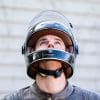 Author wearing Bell Bullitt Helmet with head raised to make chin strap visible