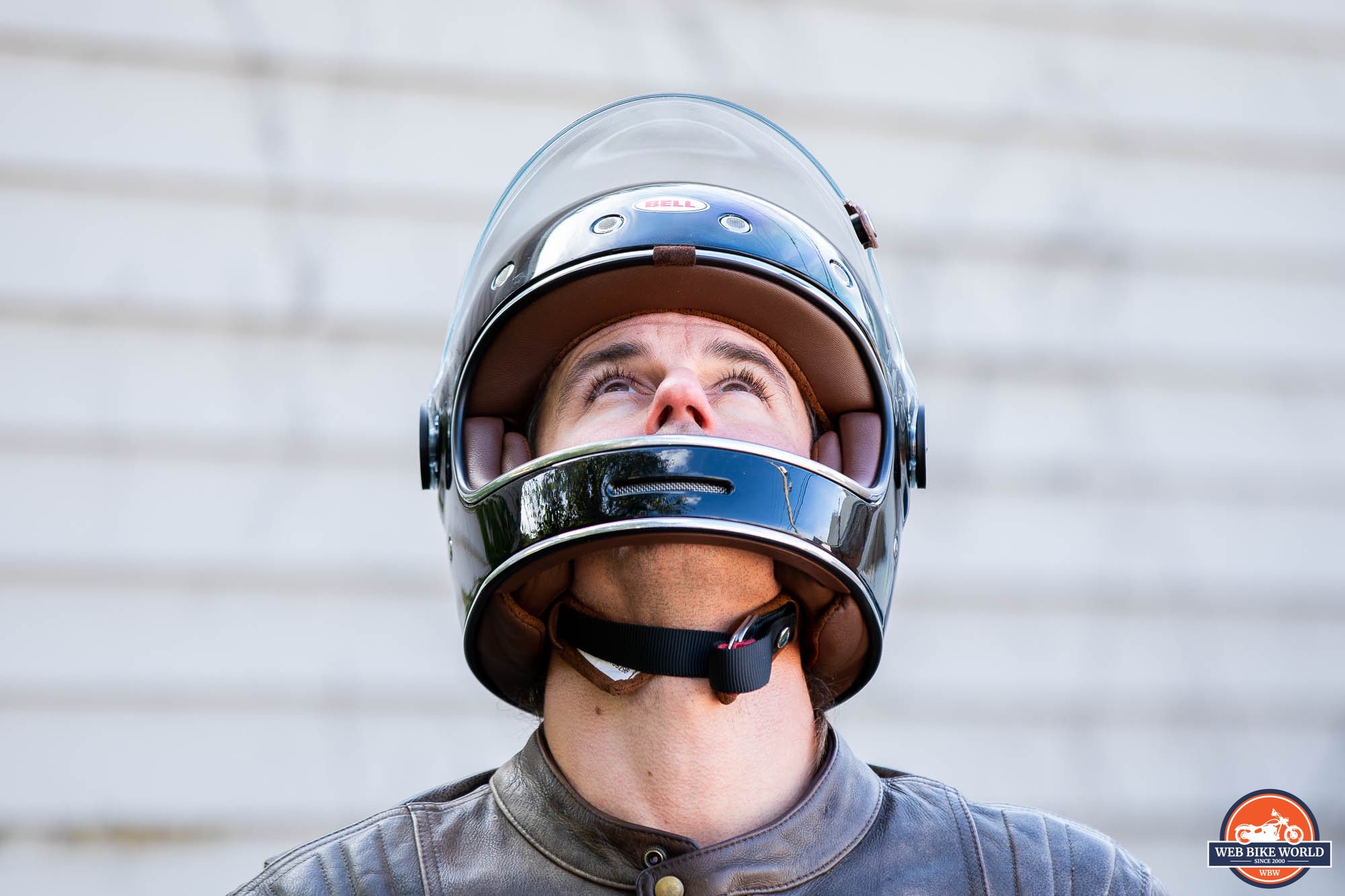 Author wearing Bell Bullitt Helmet with head raised to make chin strap visible