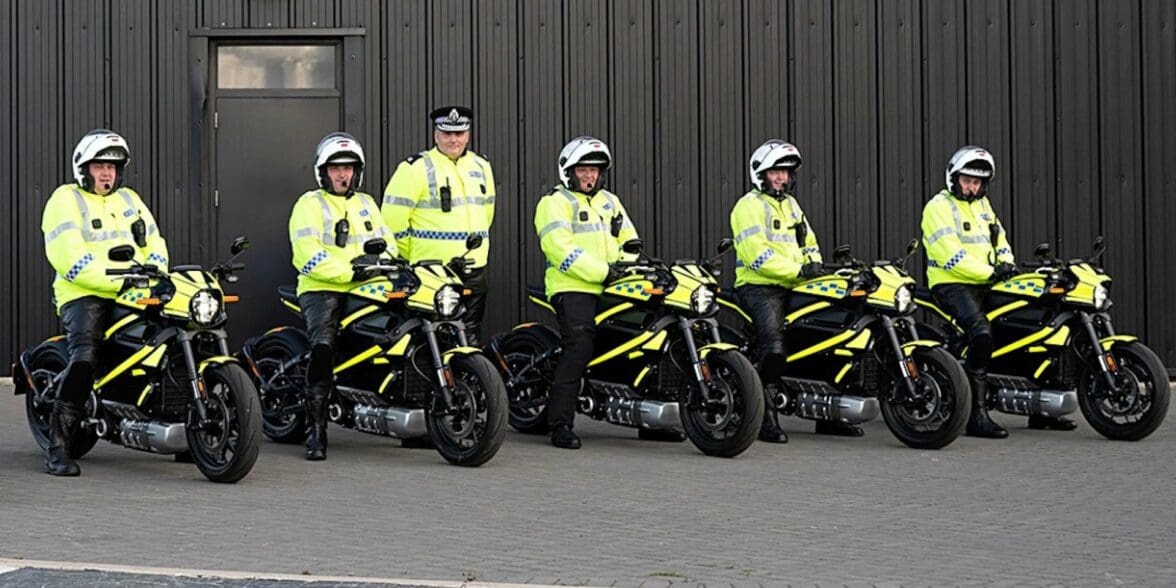 a view of policemen using the LiveWire One electric motorcycle as the force bike of choice for the COP26 of 2021