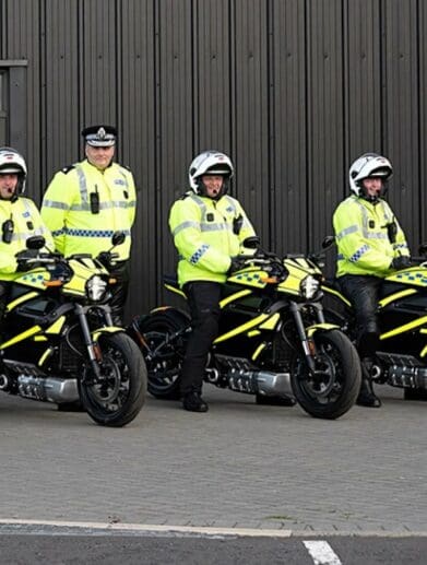 a view of policemen using the LiveWire One electric motorcycle as the force bike of choice for the COP26 of 2021