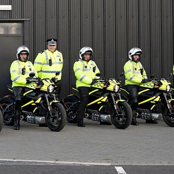 a view of policemen using the LiveWire One electric motorcycle as the force bike of choice for the COP26 of 2021