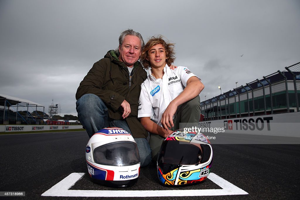 Remy Gardner with father Wayne Gardner - both of which are going down in history as the second father-son duo to secure championships for Moto2. Media source: PHILLIP ISLAND, AUSTRALIA - OCTOBER 16: Former 500cc World Champion Wayne Gardner poses with his son Remy ahead of the 2014 MotoGP of Australia at Phillip Island Grand Prix Circuit on October 16, 2014 in Phillip Island, Australia. Remmy Gardner will race this weekend in the Moto3 for Team Laglisse Calvo. (Photo by Robert Cianflone/Getty Images)