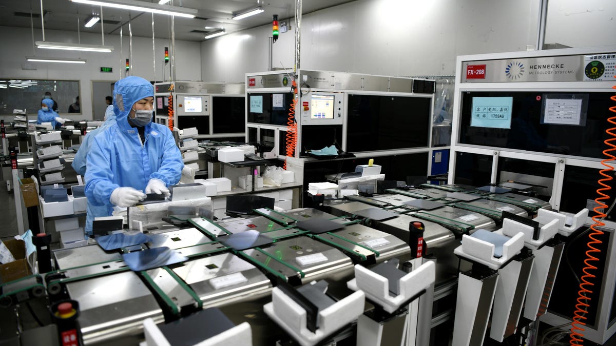 A view of workers at a semiconductor (microchip) factory