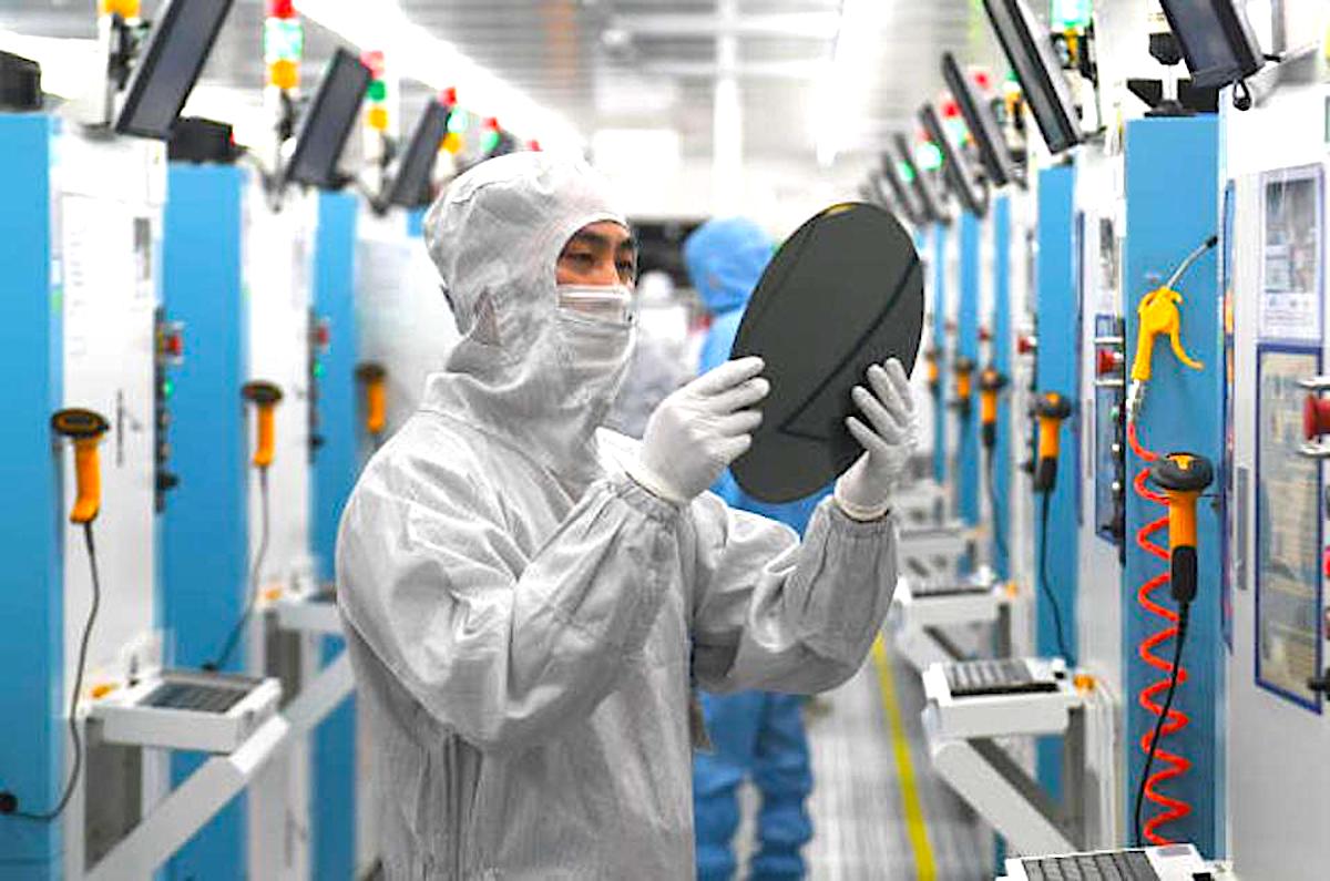 A view of workers at a semiconductor (microchip) factory