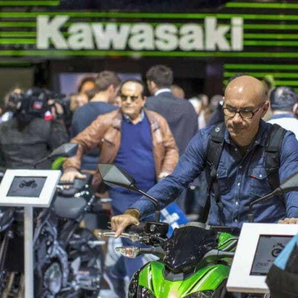 A view of people milling around the Kawasaki setup in EICMA