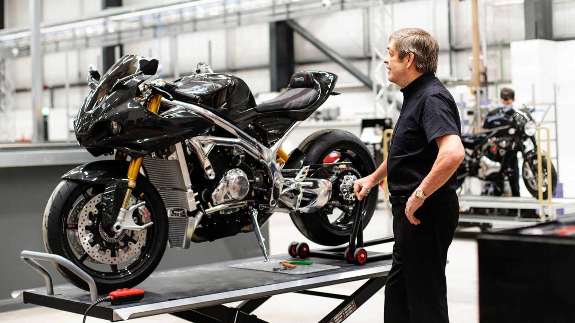 A worker focusing on a motorcycle in relation to recent news that there will soon be a magnesium shortage.