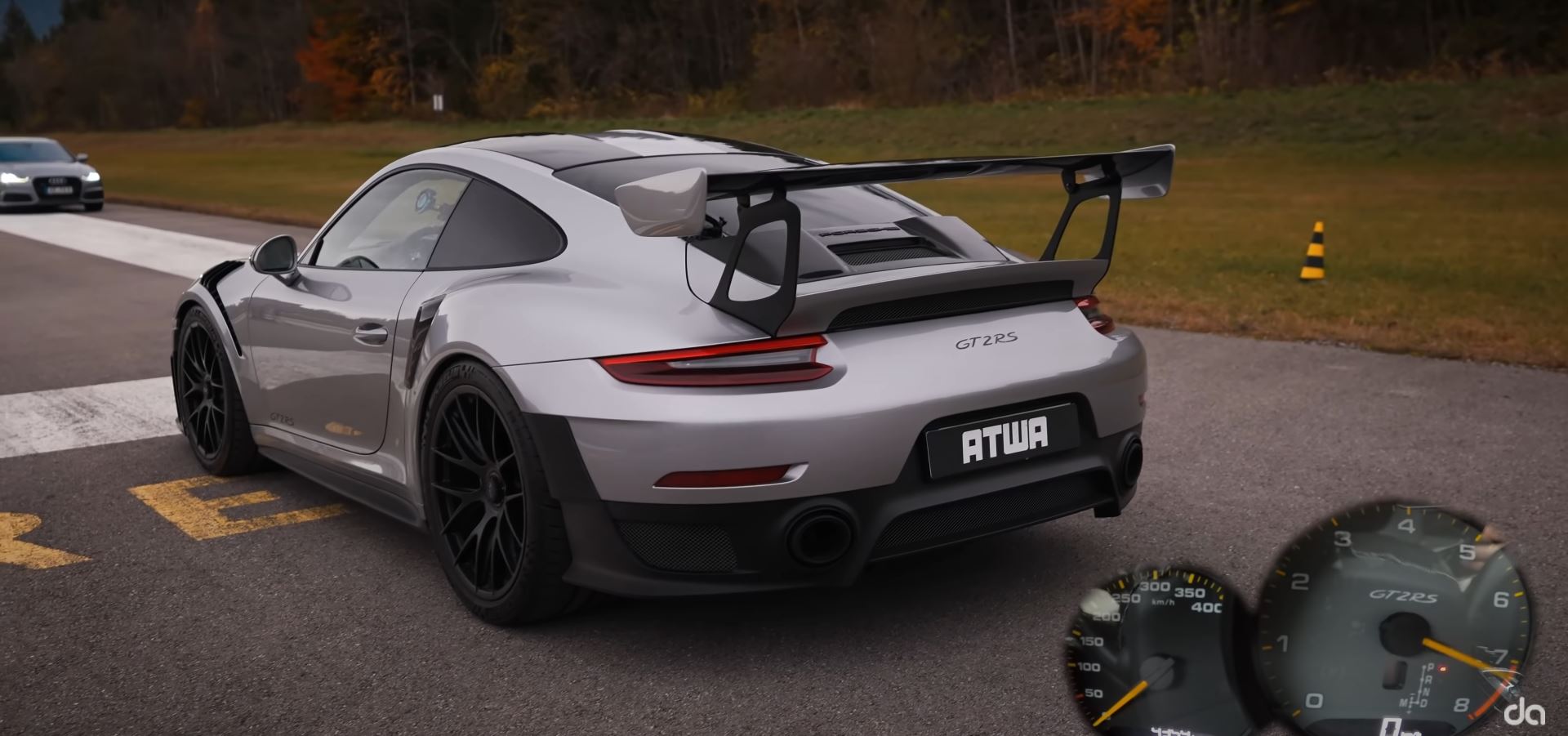 a quarter-mile drag race between a Ducati Panigale V4 S and a Porsche GT2 RS