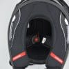 View of Scorpion EXO-R1 Air Carbon Helmet from bottom with emergency pull tabs visible