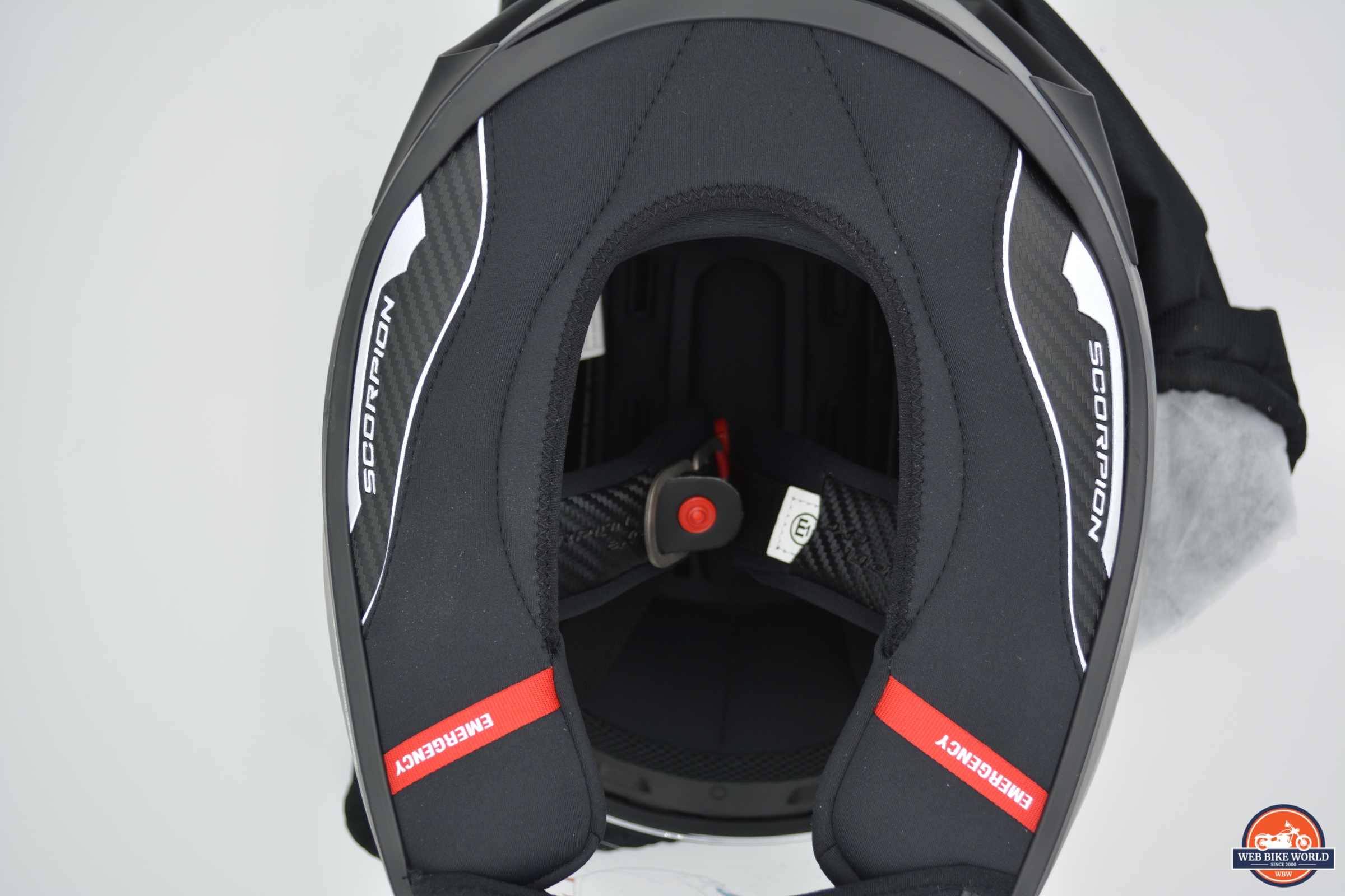 View of Scorpion EXO-R1 Air Carbon Helmet from bottom with emergency pull tabs visible