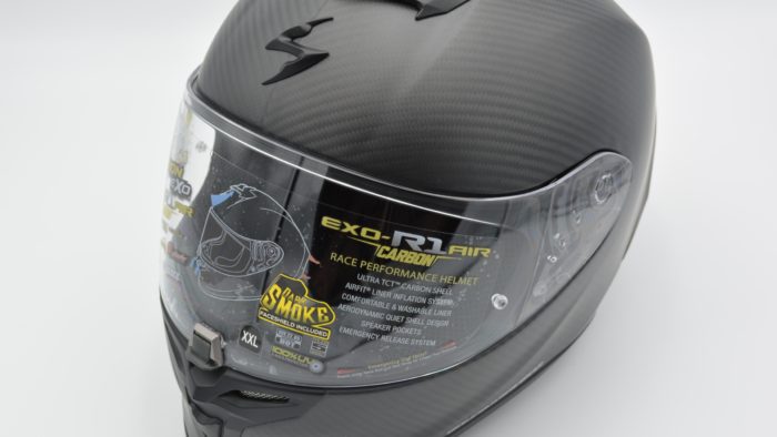 New Scorpion EXO-R1 Air Carbon Helmet on grey background