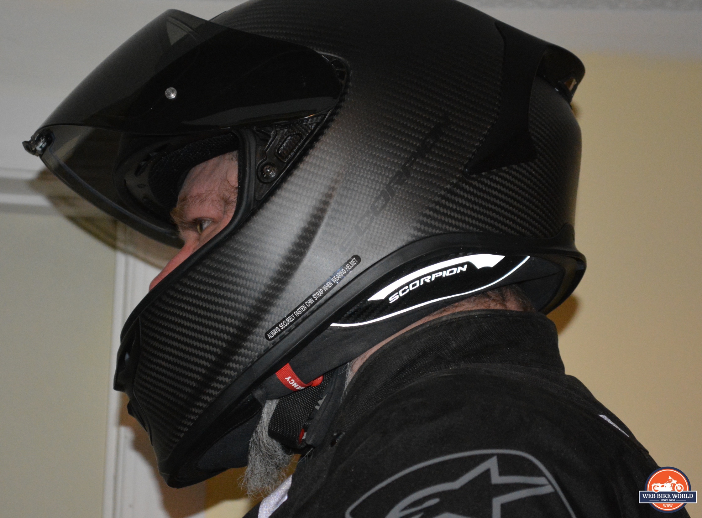 Side view of reviewer wearing the Scorpion EXO-R1 Air Carbon Helmet
