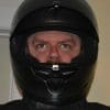 Reviewer wearing Scorpion EXO-R1 Air Carbon Helmet with visor up