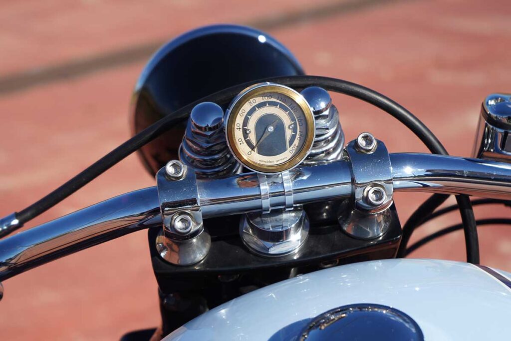 A view of the odometer on the custom Springer Bobber Blue Harley-Davidson Softail Standard Motorcycle from Lord Drake Kustoms