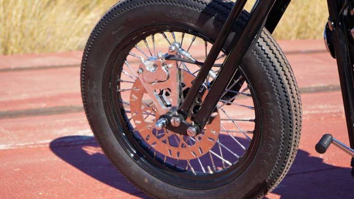 the front wheel view from the custom Springer Bobber Blue Harley-Davidson Softail Standard Motorcycle from Lord Drake Kustoms