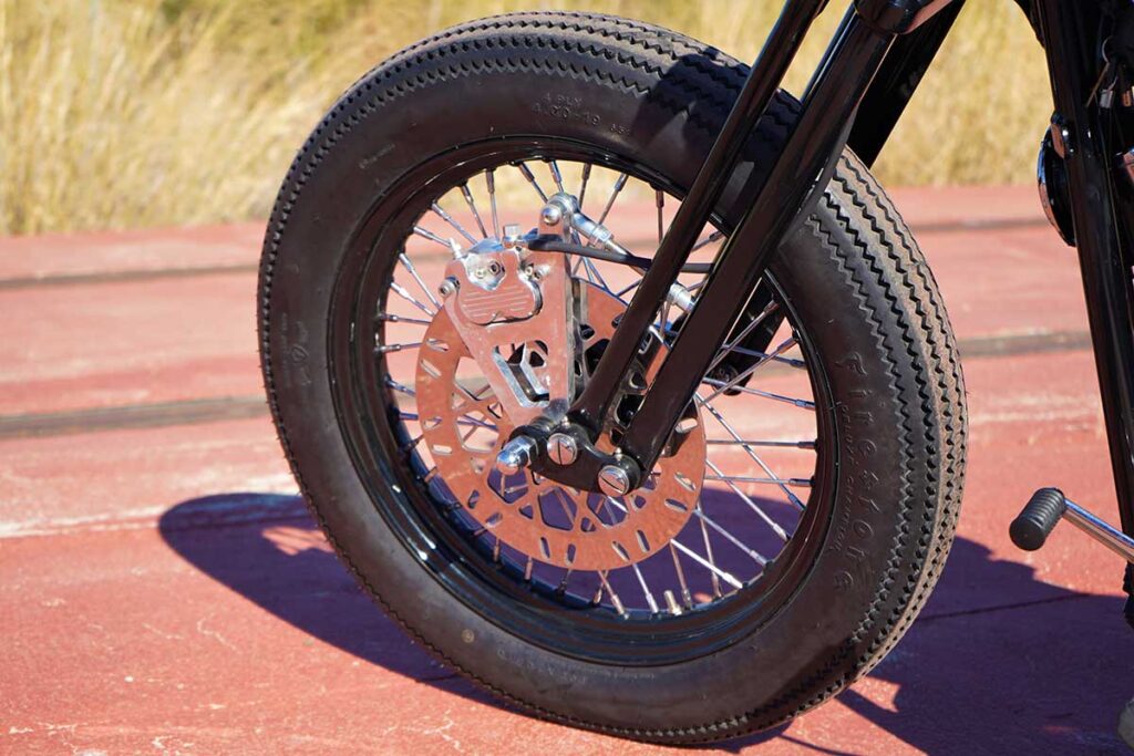 the front wheel view from the custom "Springer Bobber Blue" Harley-Davidson Softail Standard Motorcycle from Lord Drake Kustoms