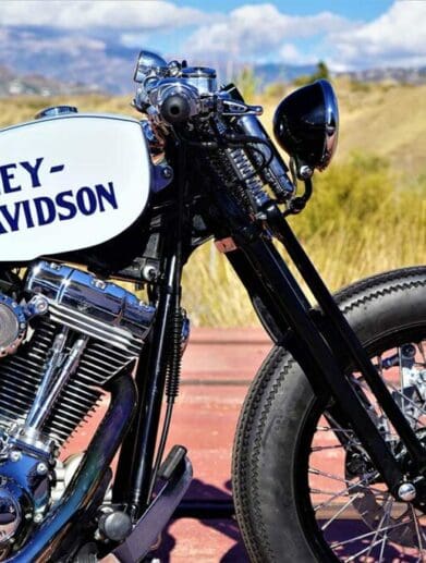 the front-side view from the custom "Springer Bobber Blue" Harley-Davidson Softail Standard Motorcycle from Lord Drake Kustoms