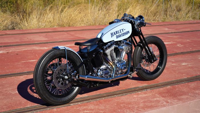 A side view from the custom Springer Bobber Blue Harley-Davidson Softail Standard Motorcycle from Lord Drake Kustoms