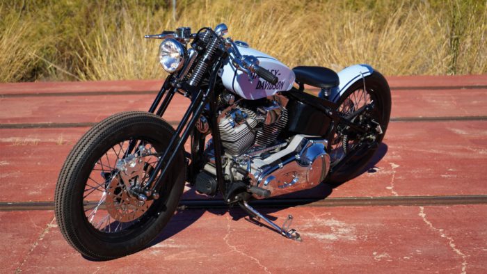 A side view from the custom Springer Bobber Blue Harley-Davidson Softail Standard Motorcycle from Lord Drake Kustoms