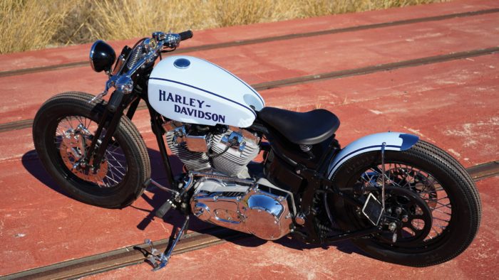 A side view from the custom Springer Bobber Blue Harley-Davidson Softail Standard Motorcycle from Lord Drake Kustoms