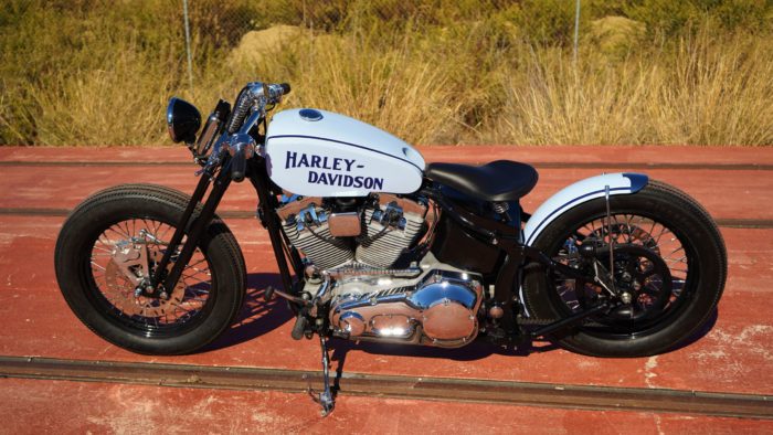 A side view from the custom Springer Bobber Blue Harley-Davidson Softail Standard Motorcycle from Lord Drake Kustoms