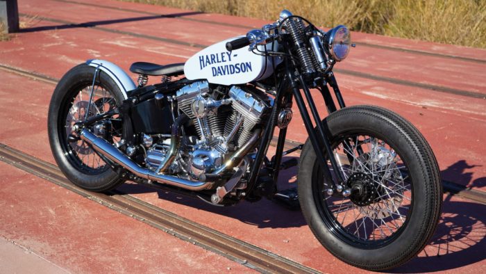 A side view from the custom Springer Bobber Blue Harley-Davidson Softail Standard Motorcycle from Lord Drake Kustoms