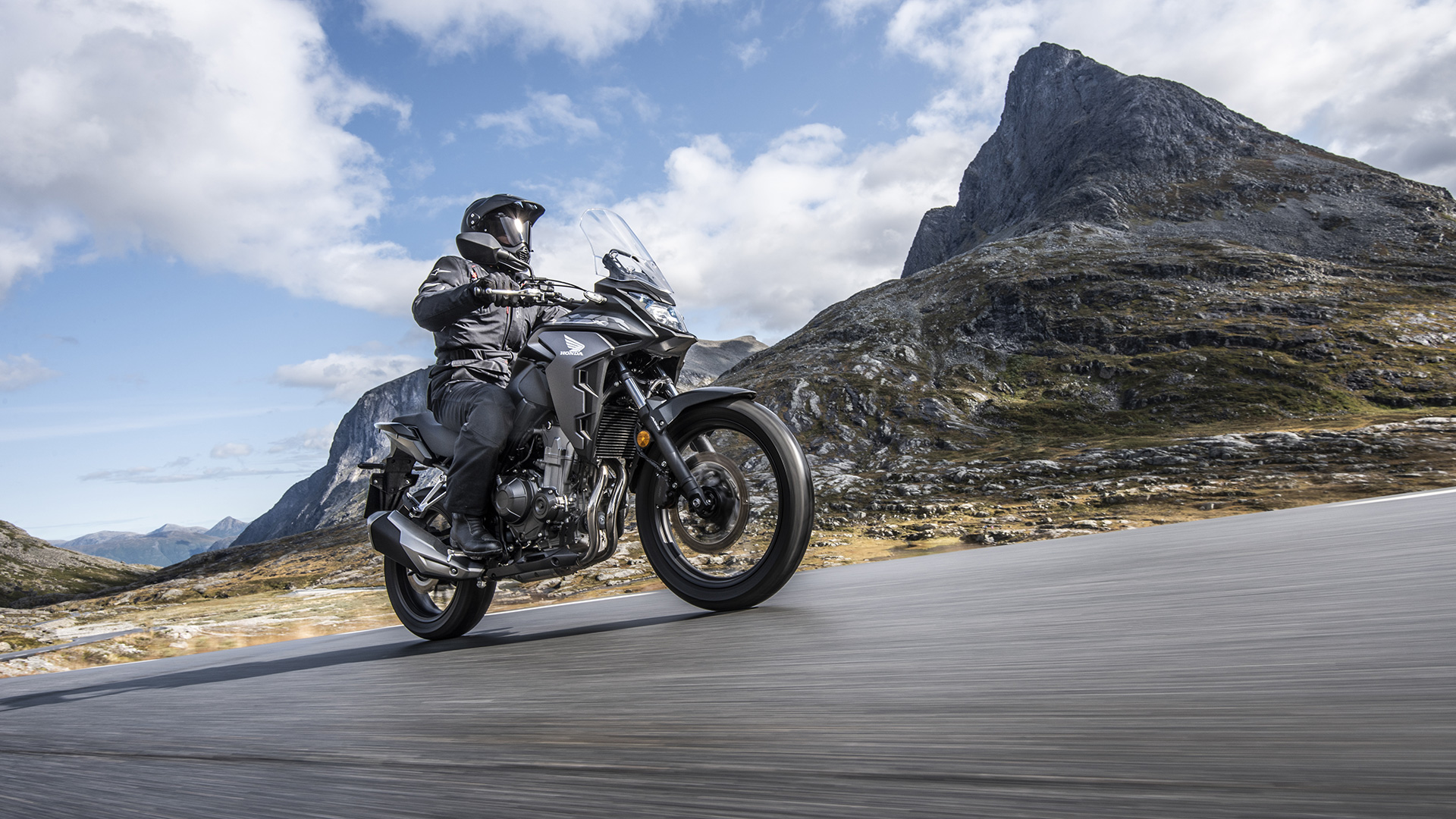 2021-Honda-CB500X with a rider going through desert-like topography