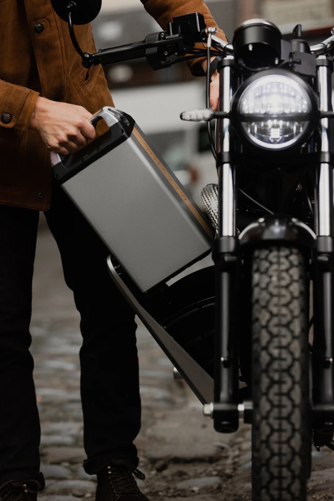 A view of the Maeving RM1 Electric motorcycle featuring swappable batteries